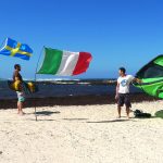 Three flags on the beach of the Boston lagoon