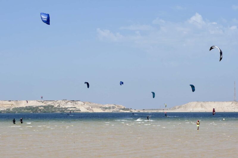 Kites riding in the lagoon.