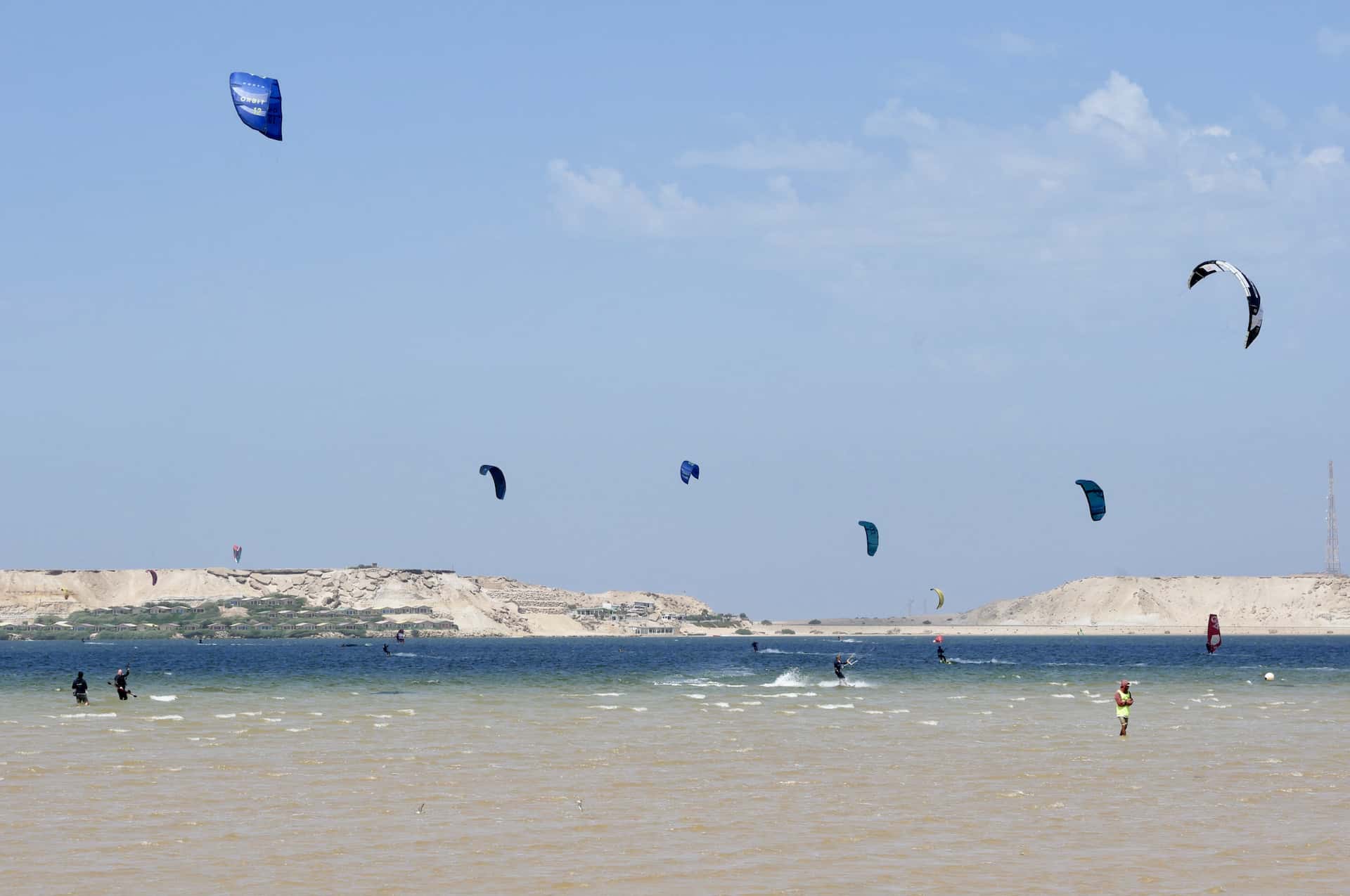 Kites riding in the lagoon.