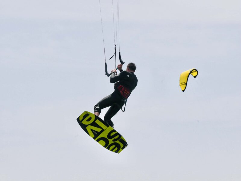 Kitelement Re Solve split kiteboard mid air.