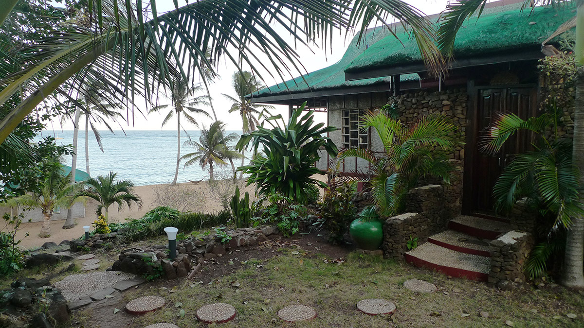 Bungalow and beach at Anino Resort, Cuyo.