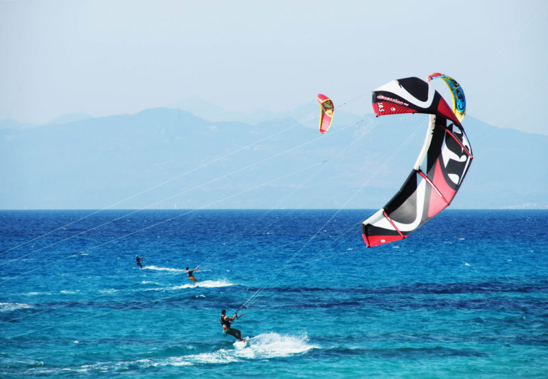 Kites on the water.