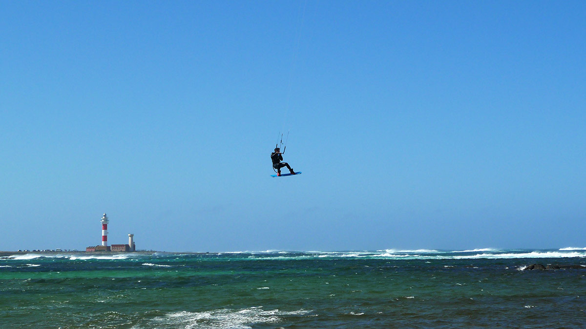 kitesurfer jumping in Toston lagoon, Fuerteventura
